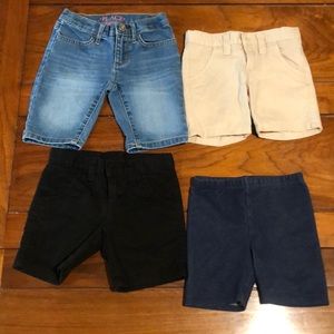 Kids size 4 shorts in color denim black and Khaki